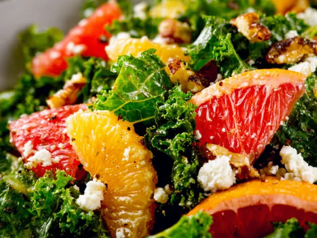 close-up of winter citrus and kale salad with grapefruit, feta, and walnuts