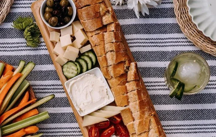 Stylish baguette board for serving fresh bread and cheese