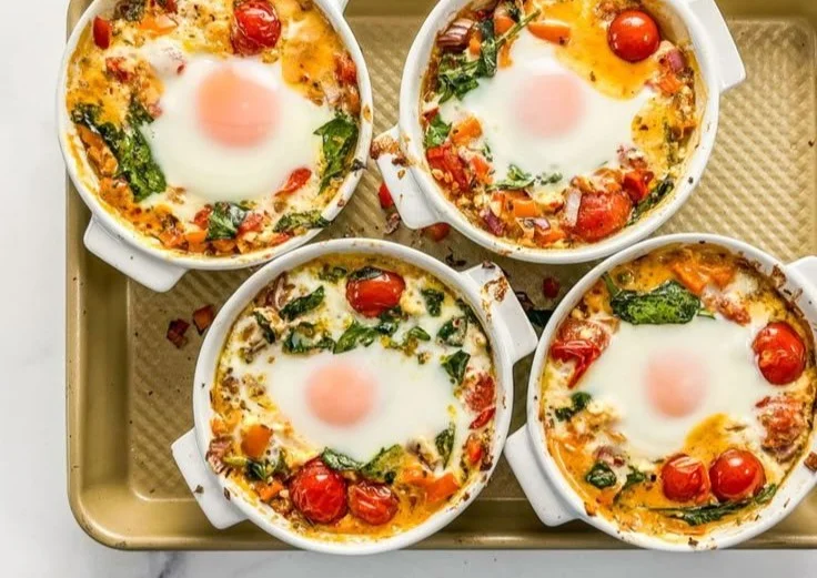 Baked Feta Eggs with Tomatoes and Spinach
