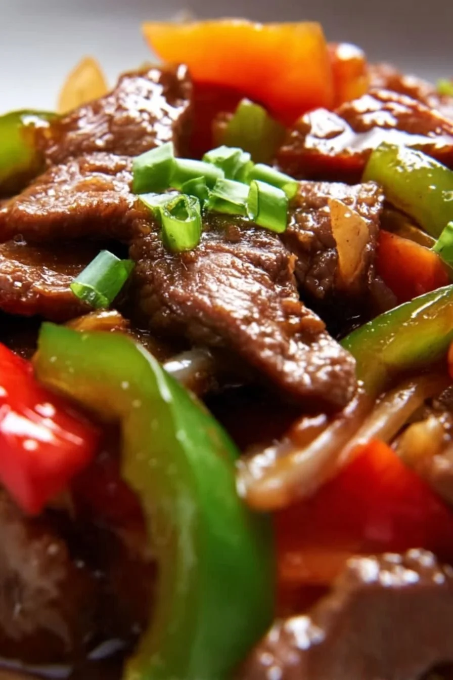 Plate of Chinese Pepper Steak with vibrant bell peppers and tender beef