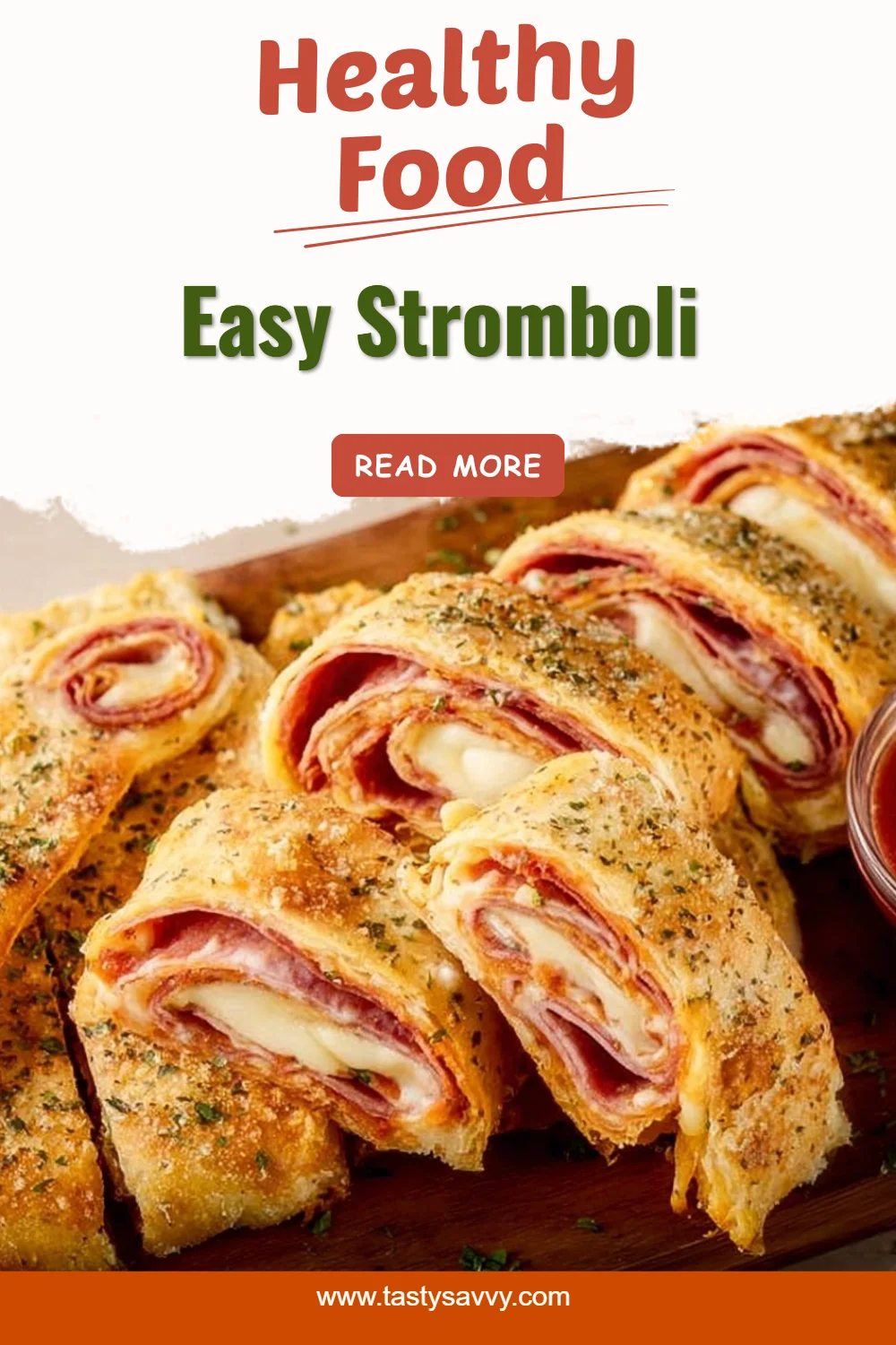 Easy Stromboli Stromboli Homemade Easy Stromboli with cheese and pepperoni on a wooden cutting board.