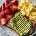 Healthy Breakfast with Eggs, Avocado, and Strawberries healthy breakfast with eggs avocado and strawber 2026 01 14 145306 683x1024 1