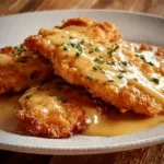 Crispy Malibu chicken served with creamy mustard sauce on a plate