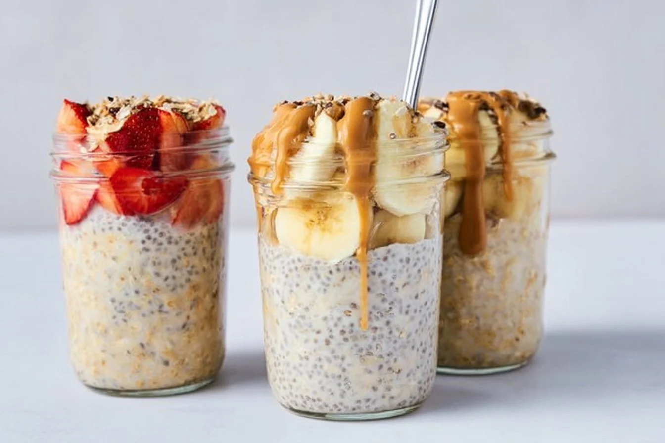 Bowl of high-protein overnight oats topped with fruits and nuts