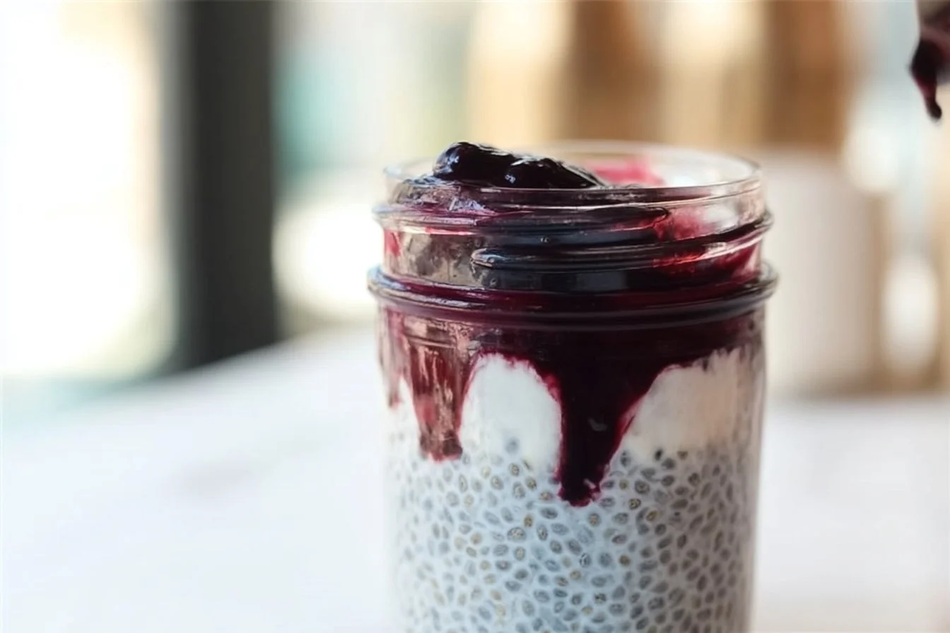 Blueberry Coconut Chia Seed Pudding chia seed pudding Blueberry Coconut Chia Seed Pudding garnished with fresh blueberries and coconut flakes