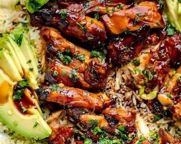 Delicious plate of Hawaiian BBQ Chicken garnished with tropical fruits