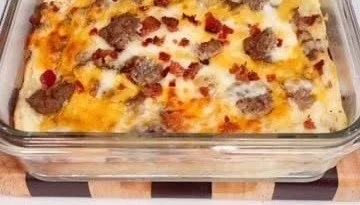 Breakfast Pizza Casserole breakfast pizza casserole Delicious breakfast pizza casserole topped with eggs, cheese, and toppings.