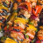 Delicious grilled Chicken Kabobs served with fresh vegetables