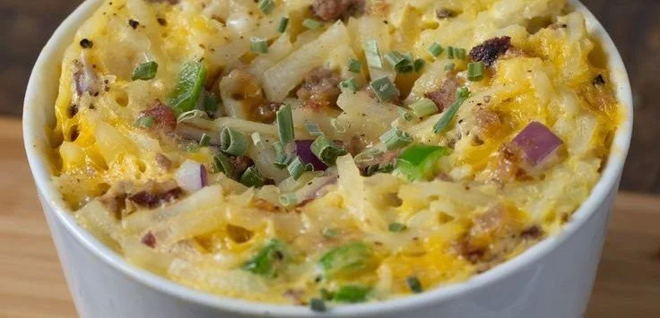 Easy microwave breakfast bowl with ingredients ready to be cooked in a microwave.