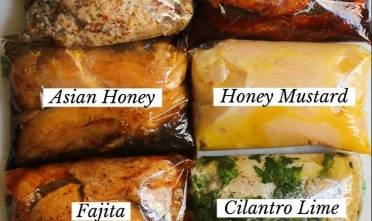Flavorful chicken marinade in a bowl with herbs and spices.