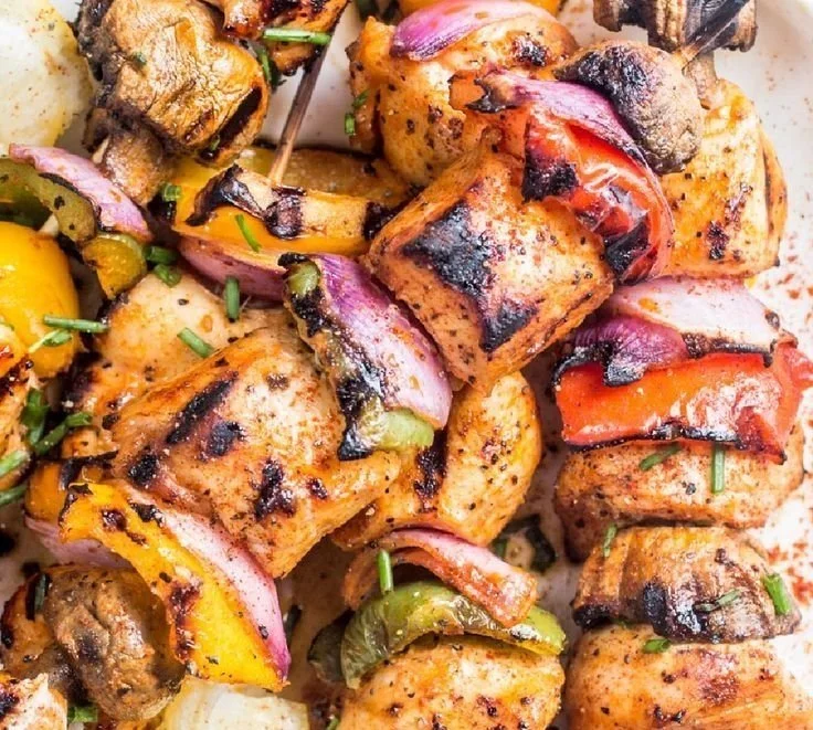 Grilled Chicken Kabobs with Vegetables chicken kabobs Grilled chicken kabobs with colorful vegetables on a skewer