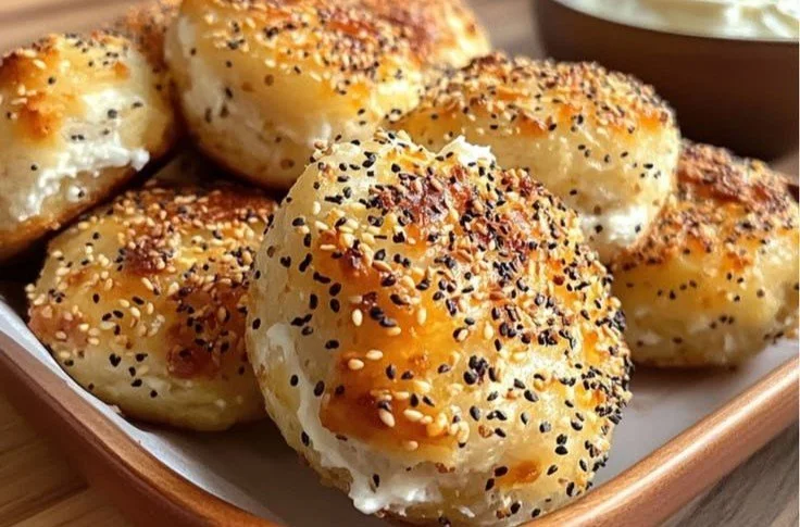 High-Protein Bagel Bites bagel bites High-protein bagel bites served on a plate with toppings.