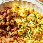 High protein breakfast bowl with eggs, quinoa, and vegetables