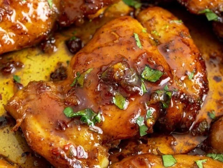 Honey Lime Chicken Honey Lime Chicken Juicy Honey Lime Chicken garnished with lime slices and fresh herbs