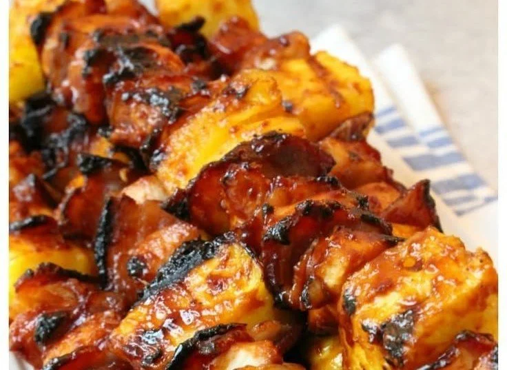 BBQ Chicken Kabobs with Bacon and Pineapple BBQ Chicken Kabobs BBQ Chicken Kabobs with Bacon and Pineapple on the grill