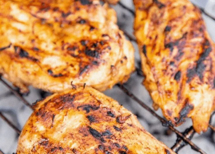 BEST Grilled Chicken grilled chicken Deliciously grilled chicken served with fresh herbs and vegetables