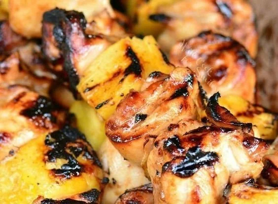Grilled Chicken with Pineapple grilled chicken Delicious grilled chicken topped with fresh pineapple slices.